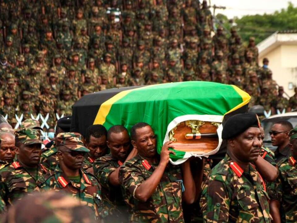 Tanzania People's Defence Force (TPDF) personnel carry the coffin of president John Magufuli in Dar es Salaam, Tanzania, on March 20, 2021. PHOTO | STR | AFP