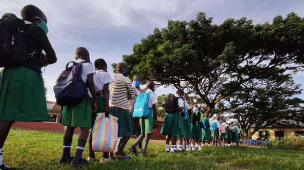 Ombaka Primary School pupils line up for temperature screening in Nyando, Kisumu(ONDARI OGEGA | NMG)