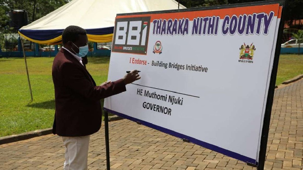 Tharaka Nithi Governor Muthomi Njuki signs a dummy BBI endorsement form, PHOTO | FILE | NMG