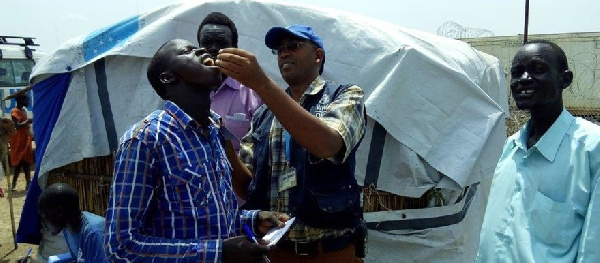 A man receiving a Cholera vaccination