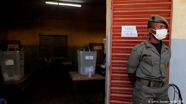 A member of the security force guarding a polling station in Ouagadougou
