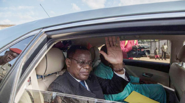 Cameroon opposition leader Maurice Kamto being driven away
