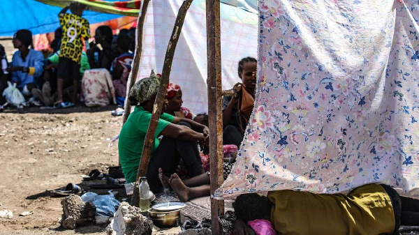 Ethiopians, who fled ongoing fighting, seen at a refugee camp in Kassala state, Sudan, (AFP)