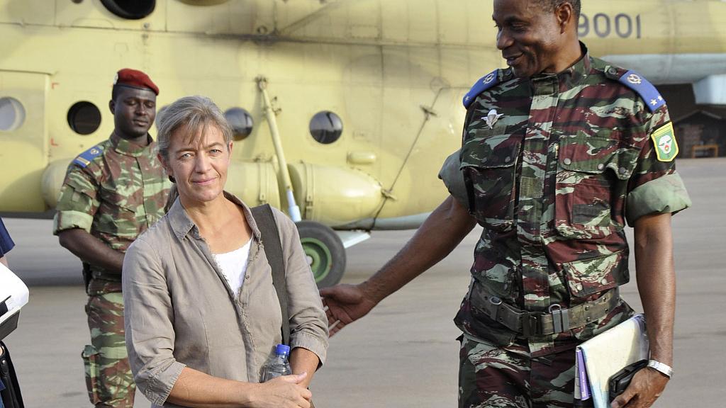 In this April 24, 2012, file photo, released Swiss hostage Beatrice Stoeckli, left, stands in Ouagadougou, Burkina Faso