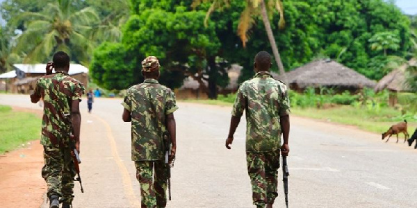 Soldiers patrol the streets after attacks in northern Mozambique