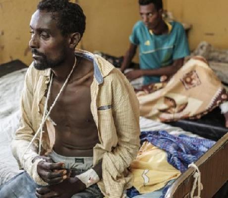 Amlaku Demeke (L) recovering with other survivors (Copyright © africanews EDUARDO SOTERAS/AFP)