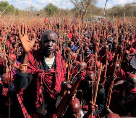 A Maasai elder blesses the celebrants during the Olng'esherr (meat-eating) passage ceremony to unite