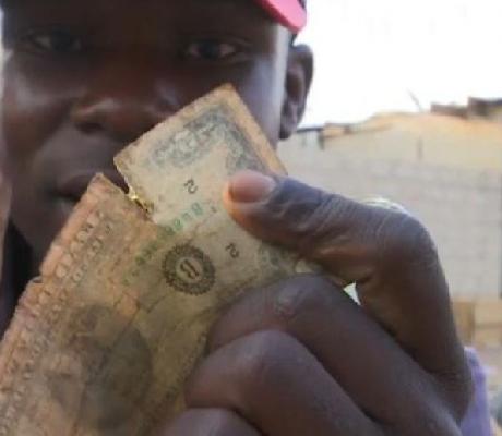 Dealers buy the tattered notes and make profits off the black market