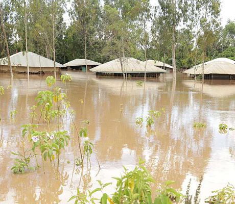 Houses are submerged after a night of heavy rain in Nyadorera
