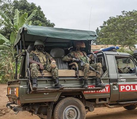 Security forces are seen near the house of Presidential candidate Robert Kyagulanyi, also known as Bobi Wine, in Magere, Uganda, on January 16, 2021