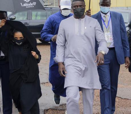 Senegalese - American performer Akon, right and his wife Rozina, arrive at the Gaddafi National mosque, in Kampala, Uganda, 