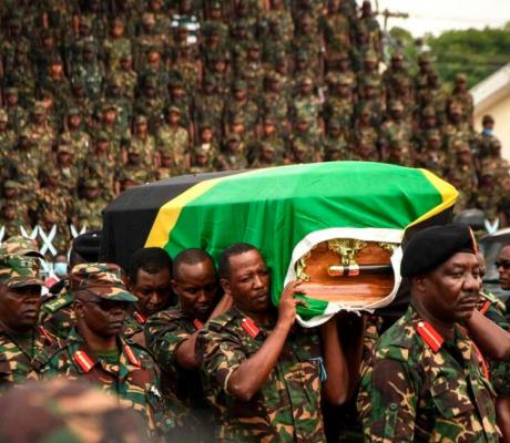 Tanzania People's Defence Force (TPDF) personnel carry the coffin of president John Magufuli in Dar es Salaam, Tanzania, on March 20, 2021. PHOTO | STR | AFP