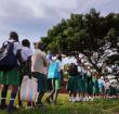 Ombaka Primary School pupils line up for temperature screening in Nyando, Kisumu(ONDARI OGEGA | NMG)