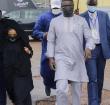 Senegalese - American performer Akon, right and his wife Rozina, arrive at the Gaddafi National mosque, in Kampala, Uganda, 