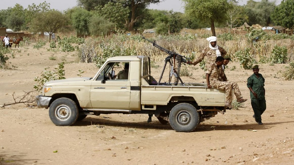 A convoy of Sudanese security forces deploy during a rally in al-Geneina, PHOTO | AFP