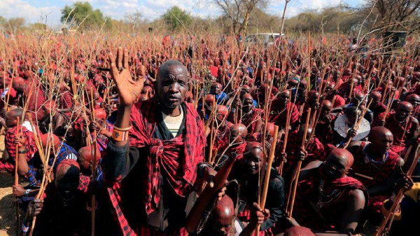 A Maasai elder blesses the celebrants during the Olng'esherr (meat-eating) passage ceremony to unite