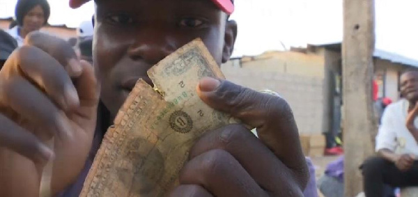 Dealers buy the tattered notes and make profits off the black market