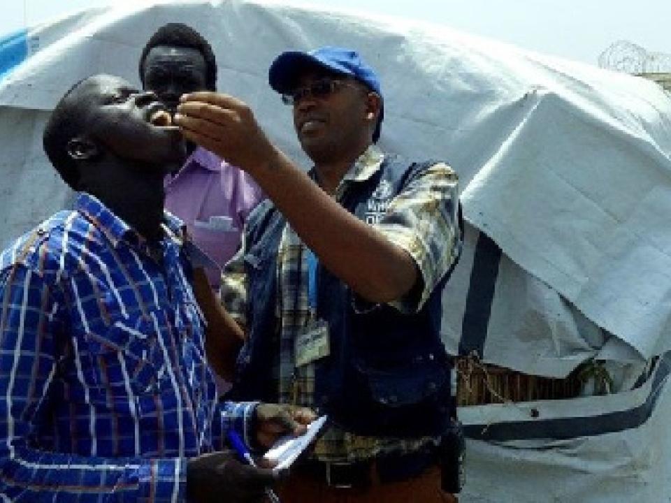 A man receiving a Cholera vaccination