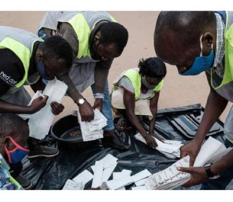 Electoral commission officials start to count ballot papers for the presidential election, | AFP