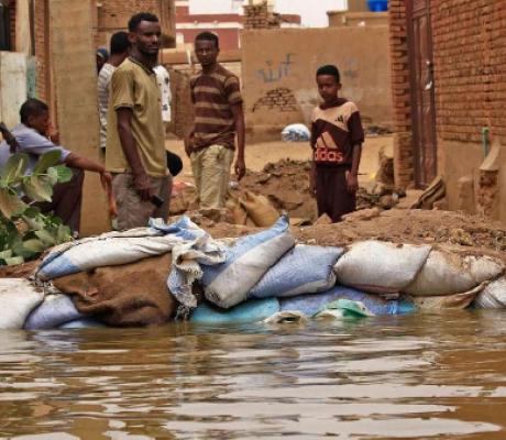 Residents of Sudan's Tuti Island have been filling bags with sand and small stones to stop the flood