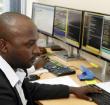 Stockbrokers monitor trade on Uganda Securities Exchange in Kampala, PHOTO | FILE | NMG